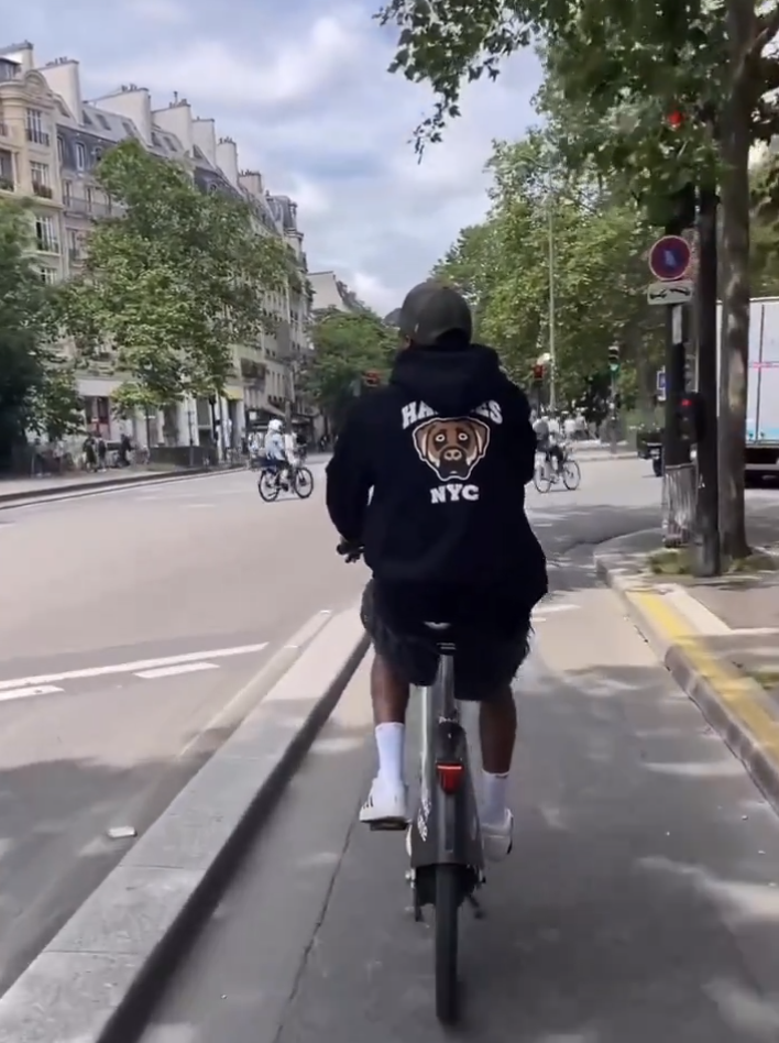 Jones was crossing an intersection in the French capital when another bike rider came speeding up and kicked the bike out from underneath Jones.